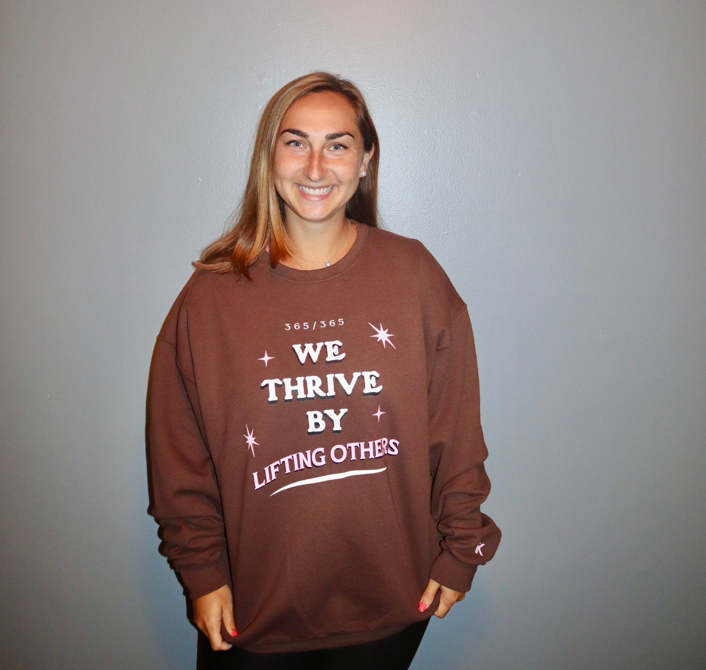 We Thrive By Lifting Others Crewneck