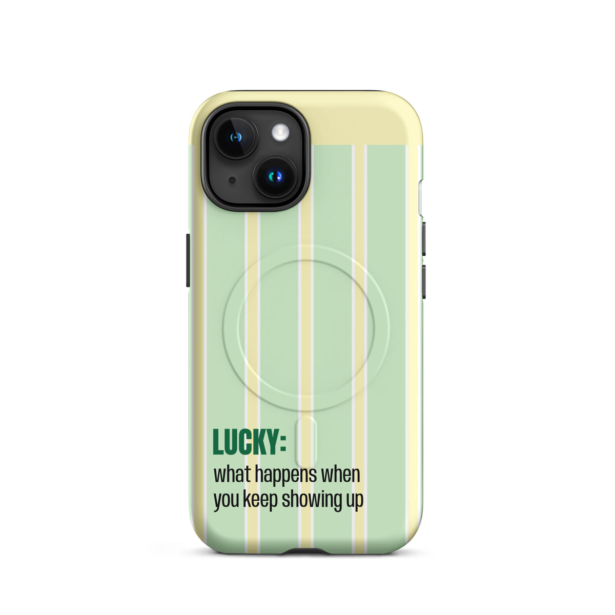 A light yellow-green phone case with vertical pale green and cream stripes, featuring a circular MagSafe-compatible ring and the text 'LUCKY: what happens when you keep showing up' on the back.