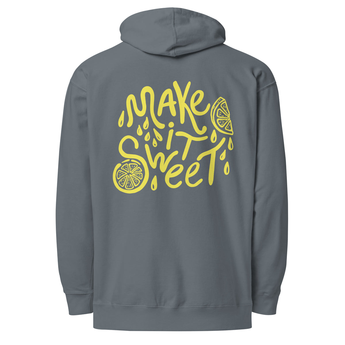 A dark gray hoodie shown from the back, featuring a large yellow graphic print that reads 'MAKE IT SWEET' in a stylized hand-drawn font, decorated with lemon slice illustrations and small droplets.